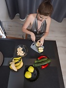 Zlata masturbates in her kitchen with a pepper - picture #12