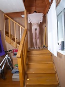 Nata strips naked on her wooden stairs - picture #18