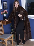 Dina models in her brown fur coat - picture #3