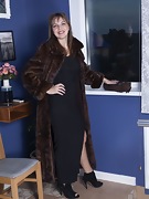 Dina models in her brown fur coat - picture #4