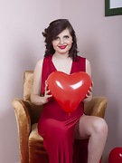 Zlata poses with her red heart air balloons - picture #2