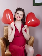 Zlata poses with her red heart air balloons - picture #4