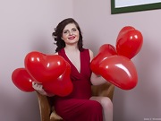 Zlata poses with her red heart air balloons - picture #9