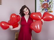 Zlata poses with her red heart air balloons - picture #11