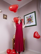 Zlata poses with her red heart air balloons - picture #13