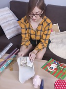 Abby gets naked during gift wrapping - picture #8