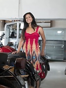 Pamela poses naked on some motorcycles - picture #5