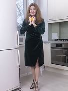 Elena V masturbates with her knife in her kitchen - picture #4
