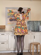 Agatha strips naked in her kitchen - picture #20