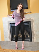 Michelle L strips by the fireplace - picture #12
