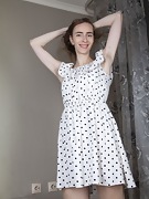 Pretty poses in her sexy dot dress - picture #14