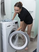 Cathy masturbates after doing her laundry - picture #3