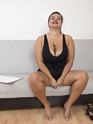 Ramira poses in her black dress on her chair - picture #25