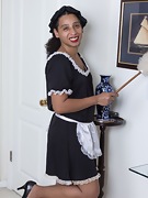 Divine poses in her sexy housemaid uniform - picture #4