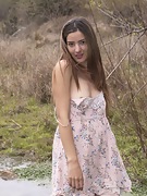 Charly masturbates while outdoors by her creek - picture #10