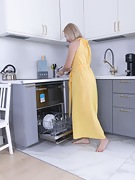 Jane Bushe strips naked in her grey kitchen - picture #2