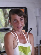 Helen H strips naked wearing her favorite apron - picture #5