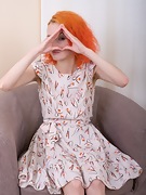 Eva Strawberry strips nude on her armchair - picture #2