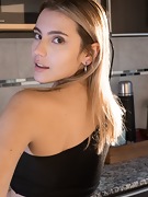 Luna Z has fun getting naked in her kitchen - picture #2
