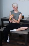 Pains enjoys a banana at her work desk naked - picture #7