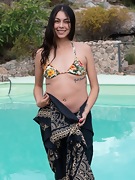 Eva One strips naked outdoors by her pool - picture #19