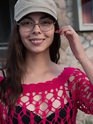 Eva One poses in her cap outside her home - picture #2