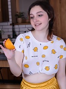 Krista Williams enjoys an orange and nakedness - picture #2