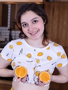 Krista Williams enjoys an orange and nakedness - picture #7