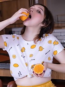 Krista Williams enjoys an orange and nakedness - picture #10