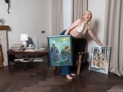 VeroniKa hangs her pictures and masturbates - picture #3