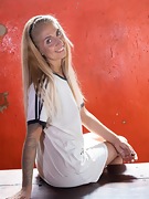 Ruby E poses in her sexy white soccer shirt - picture #2