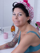 Karla Kole puts on a striptease in her bathroom - picture #8