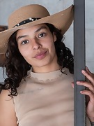 Nadia K strips naked on her staircase in her hat - picture #3