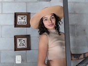 Nadia K strips naked on her staircase in her hat - picture #5