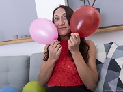 Karina Fox enjoys fun with her balloons today - picture #10