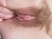 Petite hairy Krista fingers her pussy on chair - picture #29