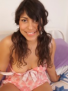 Latina Laurie gets frisky and licks her feet - picture #21