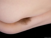 Danniella displays her hairy pussy on the couch - picture #15