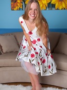 April strips in polkdot dress and plays - picture #2