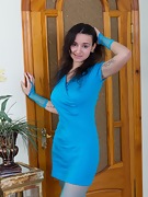 In blue, Ramira strips in stockings and gets naked - picture #1
